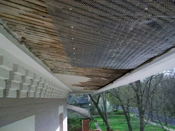 In progress: damaged stucco removed and new metal lath fastened over the old wood lath