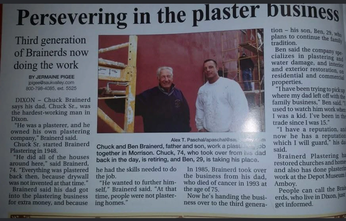 The printed Sauk Valley Media article, Persevering in the plaster business: Third generation of Brainerds now doing the work, with a photo of father and son on the job